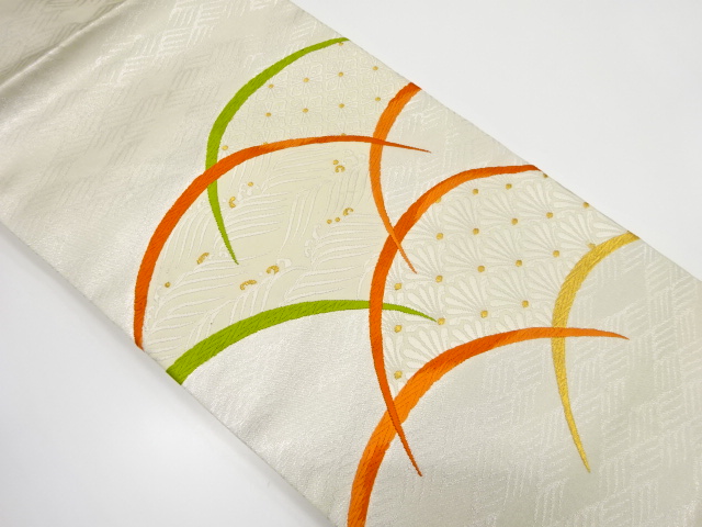 芝草に荒波・花尽くし模様織り出し　名古屋帯